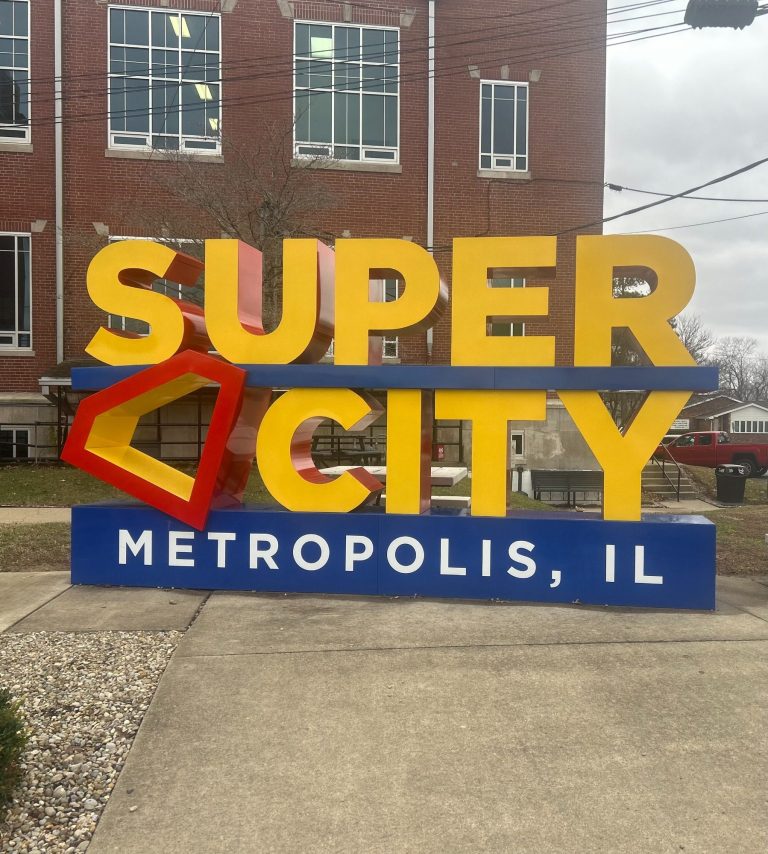 "Large Super City Metropolis IL sign in Metropolis, Illinois, celebrating the town’s superhero theme and local pride"